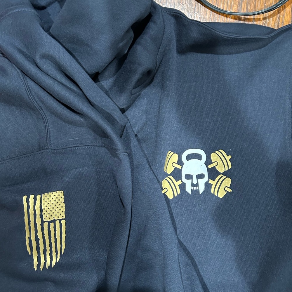 Black Hoodie with Gold Skull and Flag Design